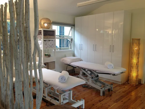 Calm, light-filled treatment room at the Headland Park studio